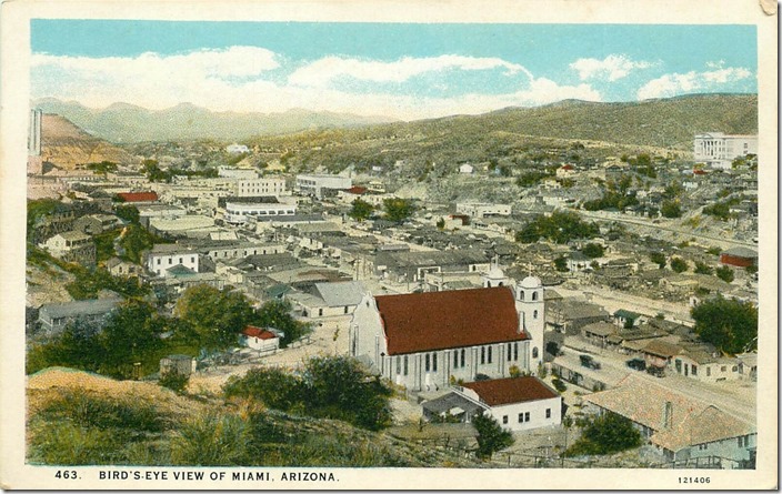 Looking southeast. Smoke stacks on far left. Railroad on right side of view in middle. Miami AZ. Scene 2.